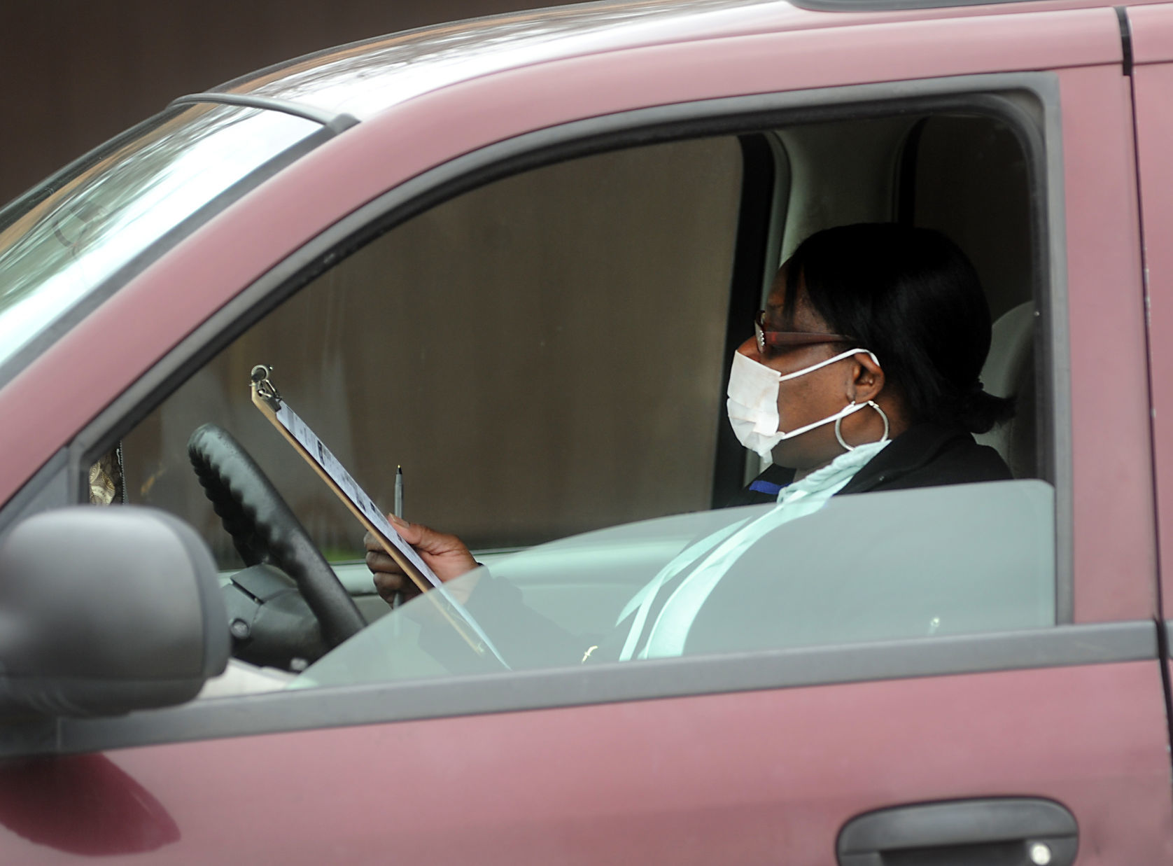 Voting in her car